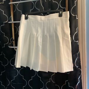 White pleaded tennis skirt